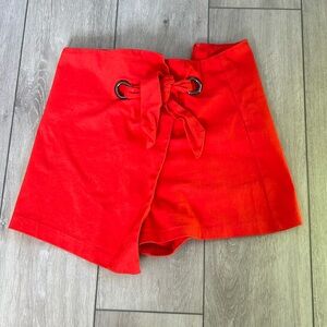 Red skort with shorts underneath size small— Judith March and like new!